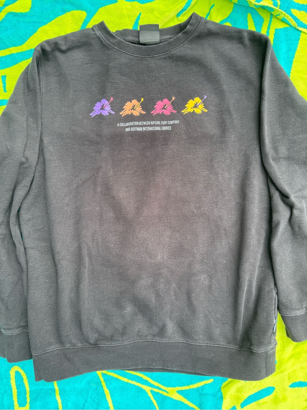 Rip Curl Black Crewneck with Purple, Orange, Pink and Yellow Floral Icons